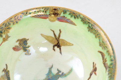 Lot 26 - A FINE DAISY MAKEIG-JONES WEDGWOOD FAIRYLAND LUSTRE FOOTED BOWL DECORATED IN THE "LEAPFROGGING ELVES" PATTERN