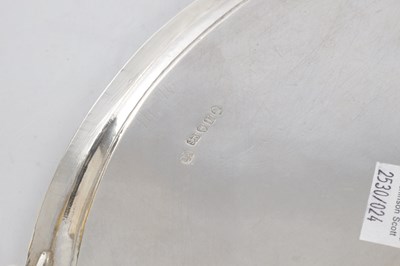 Lot 285 - A GOOD PAIR OF GEORGE III HEPPLEWHITE STYLE OVAL SILVER TRAYS