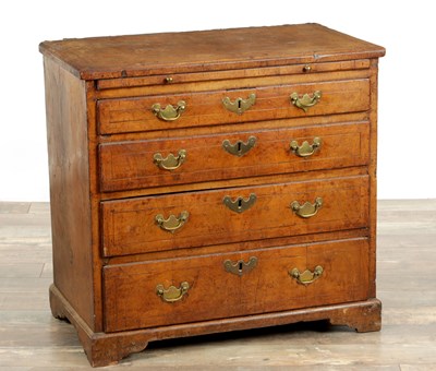 Lot 1631 - A GOOD QUEEN ANNE FIGURED WALNUT BACHELORS CHEST OF SMALL SIZE