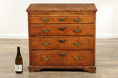 Lot 1631 - A GOOD QUEEN ANNE FIGURED WALNUT BACHELORS CHEST OF SMALL SIZE