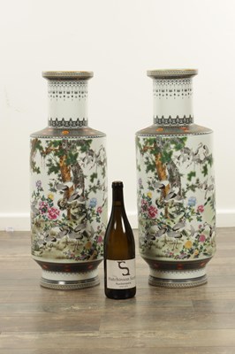 Lot 552 - A LARGE PAIR OF CHINESE REPUBLIC FAMILLE ROSE ROULEAU VASES