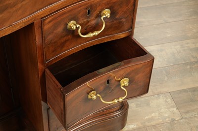 Lot 1719 - A FINE MID 18TH CENTURY MAHOGANY SERPENTINE SHAPED KNEEHOLE DESK IN THE MANNER OF THOMAS CHIPPENDALE