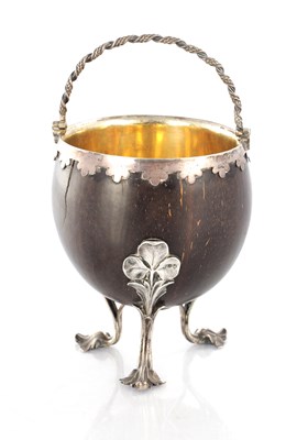 Lot 213 - A 19TH CENTURY SILVER MOUNTED COCONUT SHELL BOWL
