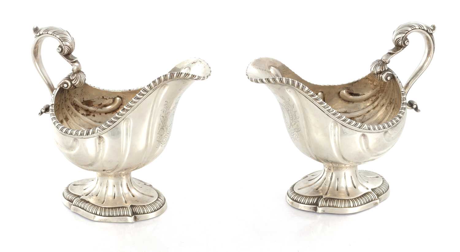 Lot 291 - A PAIR OF EARLY GEORGE III SILVER SAUCE BOATS