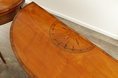 Lot 1715 - A PAIR OF GEORGE III INLAID SATINWOOD DEMI LUNE CARD TABLES IN THE MANNER OF MOORE OF DUBLIN