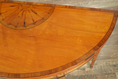 Lot 1715 - A PAIR OF GEORGE III INLAID SATINWOOD DEMI LUNE CARD TABLES IN THE MANNER OF MOORE OF DUBLIN