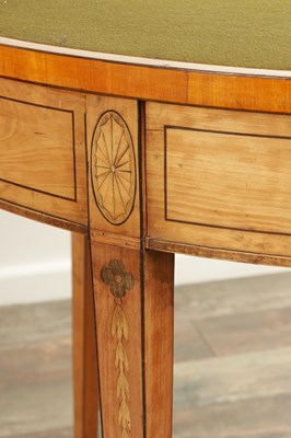 Lot 1715 - A PAIR OF GEORGE III INLAID SATINWOOD DEMI LUNE CARD TABLES IN THE MANNER OF MOORE OF DUBLIN