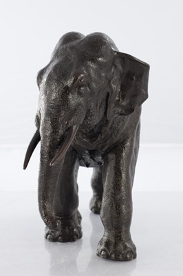 Lot 366 - A JAPANESE MEIJI PERIOD PATINATED BRONZE SCULPTURE OF AN ELEPHANT