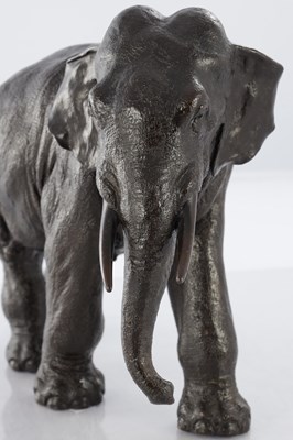 Lot 366 - A JAPANESE MEIJI PERIOD PATINATED BRONZE SCULPTURE OF AN ELEPHANT