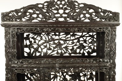 Lot 429 - A GOOD 19TH CENTURY CHINESE CARVED HARDWOOD OPEN DISPLAY CABINET