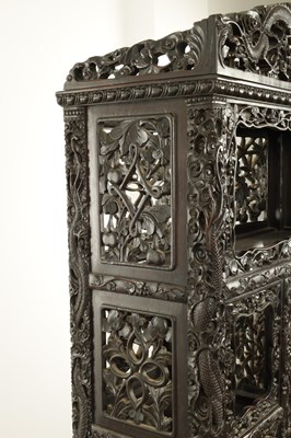 Lot 429 - A GOOD 19TH CENTURY CHINESE CARVED HARDWOOD OPEN DISPLAY CABINET