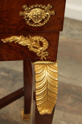 Lot 1687 - A 19TH CENTURY FRENCH EMPIRE FIGURED MAHOGANY AND ORMOLU MOUNTED WORK TABLE