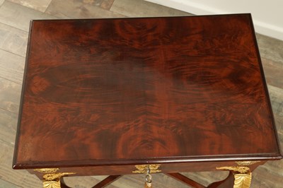 Lot 1687 - A 19TH CENTURY FRENCH EMPIRE FIGURED MAHOGANY AND ORMOLU MOUNTED WORK TABLE