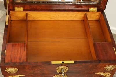 Lot 1687 - A 19TH CENTURY FRENCH EMPIRE FIGURED MAHOGANY AND ORMOLU MOUNTED WORK TABLE