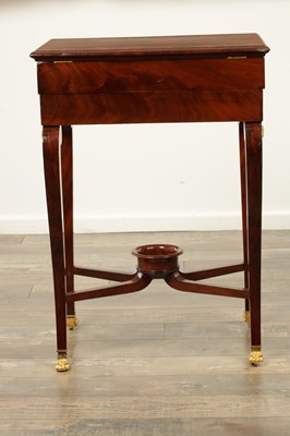 Lot 1687 - A 19TH CENTURY FRENCH EMPIRE FIGURED MAHOGANY AND ORMOLU MOUNTED WORK TABLE