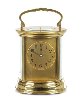 Lot 1389 - A GIANT FRENCH OVAL REPEATING CARRIAGE CLOCK