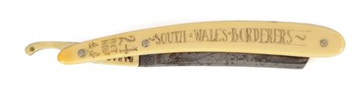 Lot 700 - A TRENCH ART SCRIMSHAW RAZOR FOR “THE IMMORTELLES” 24TH FOOT REGIMENT