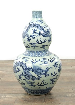 Lot 443 - A LARGE CHINESE PORCELAIN BLUE AND WHITE DOUBLE GOURD VASE