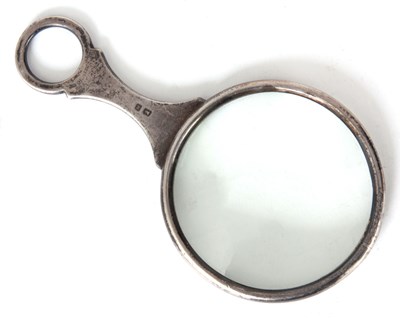 Lot 317 - AN EARLY 20th CENTURY SILVER MAGNIFYING GLASS...