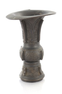 Lot 460 - A MING DYNASTY CHINESE BRONZE GU VASE