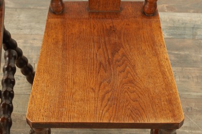 Lot 1590 - AN UNUSUAL PAIR OF ARTS AND CRAFTS OAK HALL CHAIRS