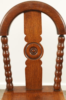 Lot 1590 - AN UNUSUAL PAIR OF ARTS AND CRAFTS OAK HALL CHAIRS