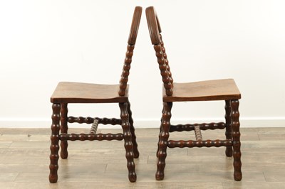 Lot 1590 - AN UNUSUAL PAIR OF ARTS AND CRAFTS OAK HALL CHAIRS