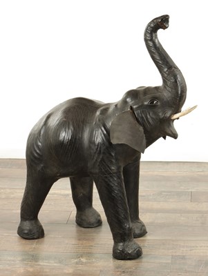 Lot 912 - A VINTAGE LEATHER BOUND SCULPTURE OF AN ELEPHANT