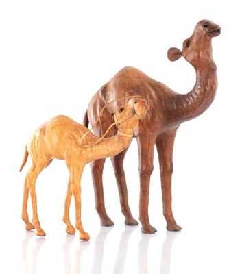 Lot 774 - TWO VINTAGE LEATHER BOUND SCULPTURES OF CAMELS