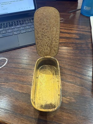 Lot 378 - A CHINESE GILT BRONZE AND CARVED JADE SNUFF BOX