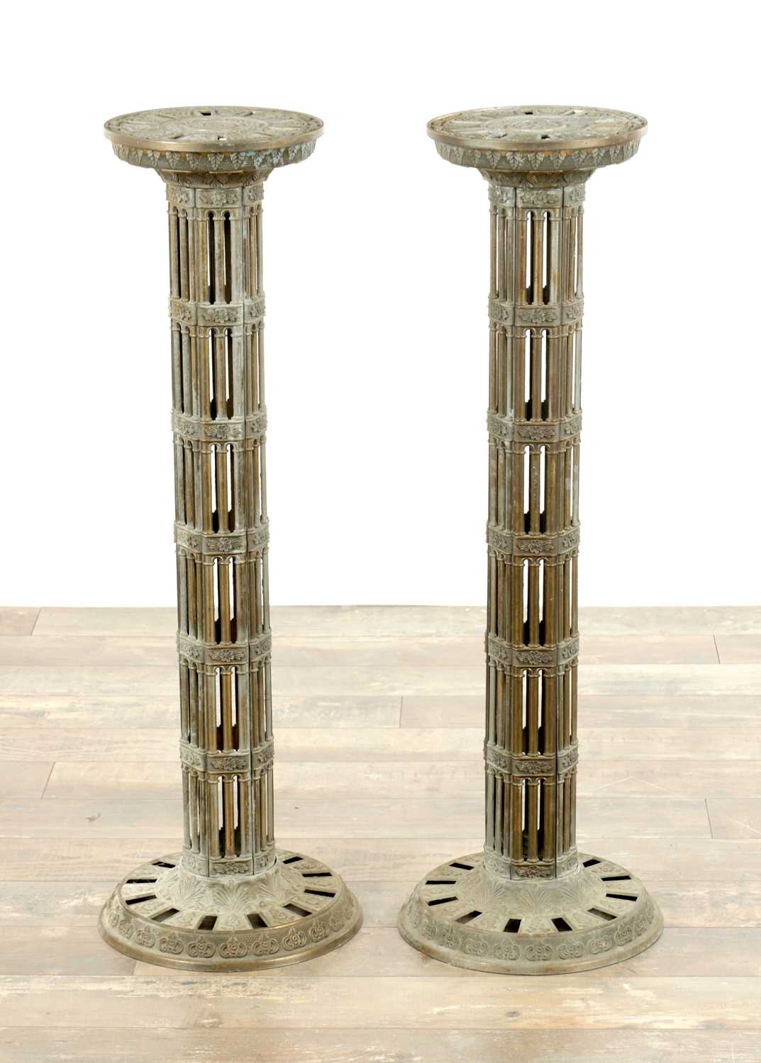 Lot 748 - A PAIR OF LATE 19TH CENTURY BRASS GOTHIC STYLE TORCHIERES