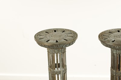 Lot 748 - A PAIR OF LATE 19TH CENTURY BRASS GOTHIC STYLE TORCHIERES