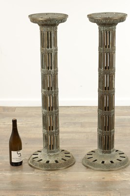 Lot 748 - A PAIR OF LATE 19TH CENTURY BRASS GOTHIC STYLE TORCHIERES