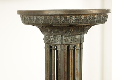 Lot 748 - A PAIR OF LATE 19TH CENTURY BRASS GOTHIC STYLE TORCHIERES