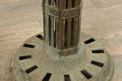 Lot 748 - A PAIR OF LATE 19TH CENTURY BRASS GOTHIC STYLE TORCHIERES
