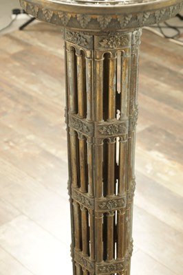 Lot 748 - A PAIR OF LATE 19TH CENTURY BRASS GOTHIC STYLE TORCHIERES