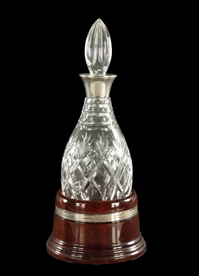 Lot 280 - A 20TH CENTURY CUT GLASS SILVER MOUNTED DECANTER