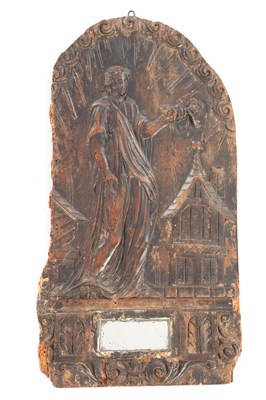 Lot 937 - AN EARLY 17TH CENTURY CARVED WALNUT PANEL