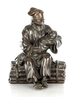 Lot 444 - A JAPANESE MEIJI PERIOD BRONZE OKIMONO OF AN ELDER HOLDING A BABY