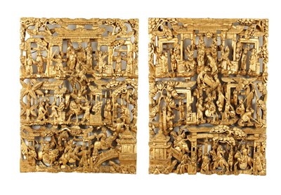 Lot 349 - A PAIR OF CHINESE CARVED GILT WOOD FIGURAL PANELS