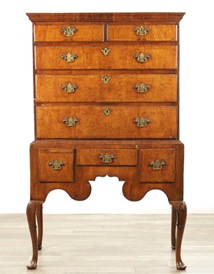 Lot 1690 - A QUEEN ANNE FIGURED WALNUT CHEST OF STAND