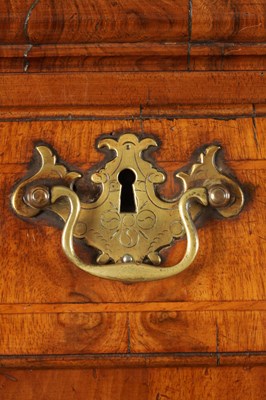 Lot 1690 - A QUEEN ANNE FIGURED WALNUT CHEST OF STAND