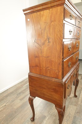 Lot 1690 - A QUEEN ANNE FIGURED WALNUT CHEST OF STAND