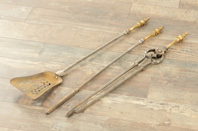 Lot 795 - A SET OF REGENCY GILT BRASS AND STEEL FIRE IRONS