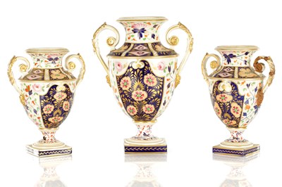 Lot 90 - A 19TH CENTURY DERBY PORCELAIN THREE VASE GARNITURE