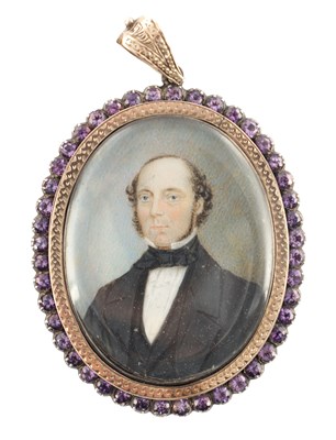 Lot 1091 - AN EARLY 19TH CENTURY 9CT GOLD AND AMETHYST FRAMED MINIATURE PORTRAIT ON IVORY