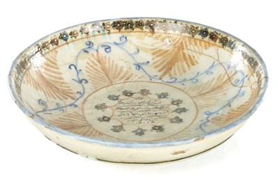 Lot 532 - AN EARLY CERAMIC ISLAMIC CHARGER