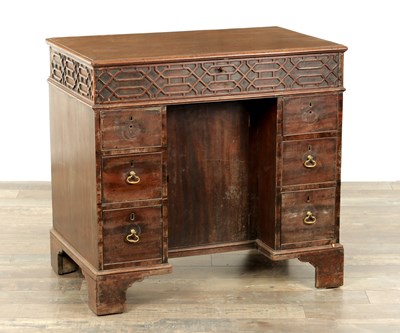 Lot 1627 - A GEORGE III MAHOGANY CHIPPENDALE STYLE KNEEHOLE DESK