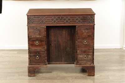 Lot 1627 - A GEORGE III MAHOGANY CHIPPENDALE STYLE KNEEHOLE DESK