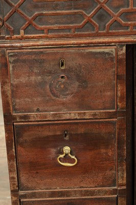 Lot 1627 - A GEORGE III MAHOGANY CHIPPENDALE STYLE KNEEHOLE DESK